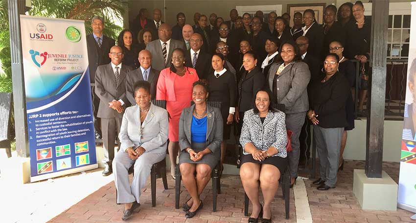 Image: Front row (L-R) : Gloria Augustus, Technical Specialist, JJRP2, OECS Commission; Simone Brown, Education Development Officer, USAID ESC; Her Ladyship Honourable Gertel Thom, Justice of Appeal and Chairman of Judicial Education Institute of the Eastern Caribbean Supreme Court. Also pictured are High Court Judges, and administrative representatives of the Eastern Caribbean Supreme Court, Magistrates of the OECS, OECS Bar Association, and OECS Ministry of Justice representatives.