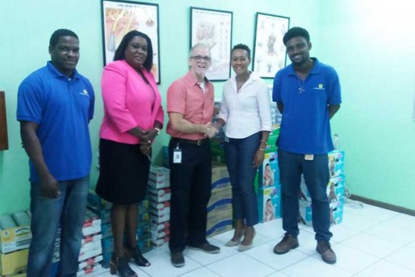 Image: J.E. Bergasse & Company Ltd. (JEB) handover to the Rotary Club of Saint Lucia (RCSL). (from left to right): Nicholas Charlemagne -- JEB Rep; Selma St. Prix, IPP RCSL; Anthony Bergasse, Managing Director; Joanna Charles, President, RCSL and Kervin Antoine, JEB Rep.
