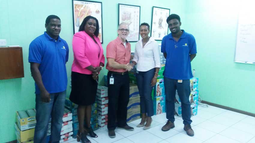 Image: J.E. Bergasse & Company Ltd. (JEB) handover to the Rotary Club of Saint Lucia (RCSL). (from left to right): Nicholas Charlemagne -- JEB Rep; Selma St. Prix, IPP RCSL; Anthony Bergasse, Managing Director; Joanna Charles, President, RCSL and Kervin Antoine, JEB Rep.