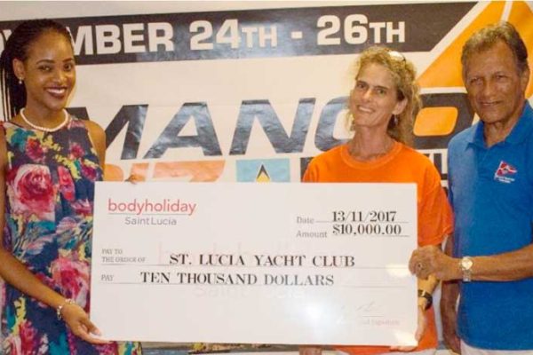 Image: (L-R) Body Holiday Marketing Representative, Consuela Dupal-Florent, presenting sponsorship cheque to Regatta Director Lily Bergasse and SLYC Commodore Gene Lawerence. (Photo: SLYC)
