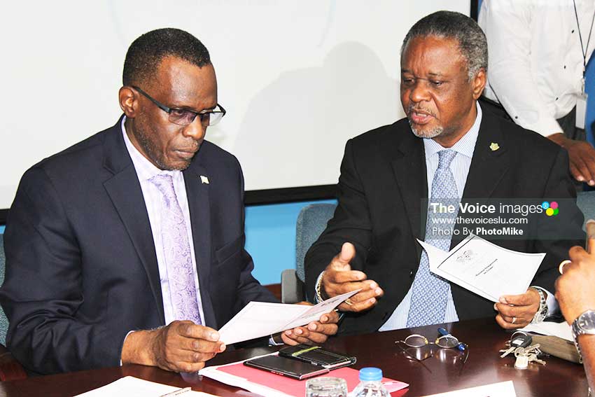 Image: Opposition Leader Pierre (left) with National Security Minister Francis in discussion just before the commencement of yesterday’s symposium. (PhotoMike)