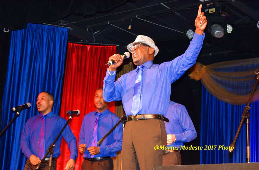 Image of Chester Hinkson leading the choir!