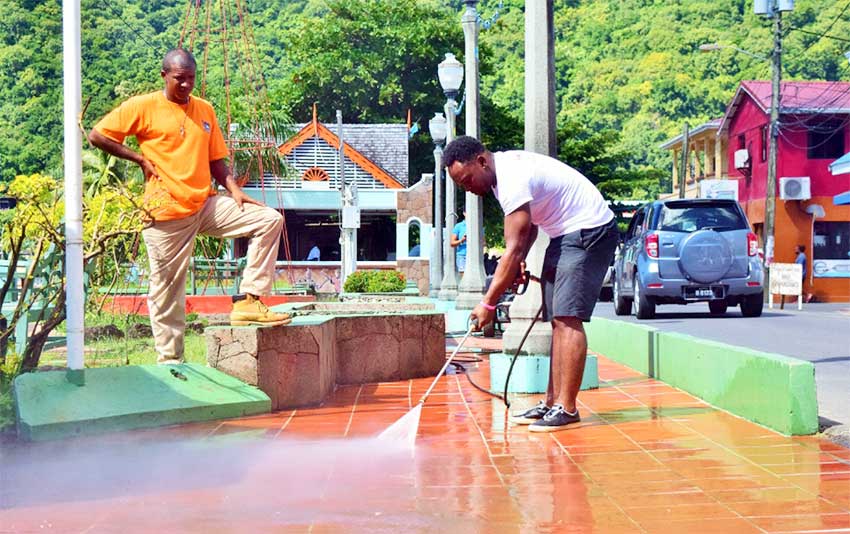 Image: Flow colleagues spent much of the day pressure washing the Soufrière waterfront park.