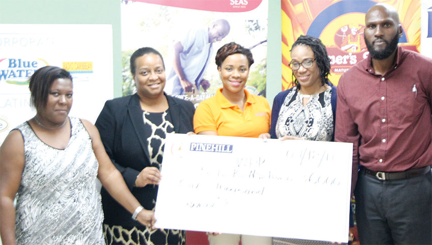 Image: Presentation of cheque by PCD representatives.
