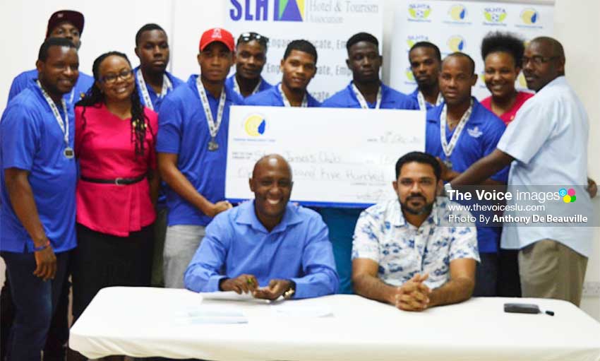 Image: Silver medalist team, St. James Morgan Bay, with manager Frankie Joseph (far right) and SLHTA representatives Roderick Cherry and NooraniAzeez. (PHOTO: Anthony De Beauville)