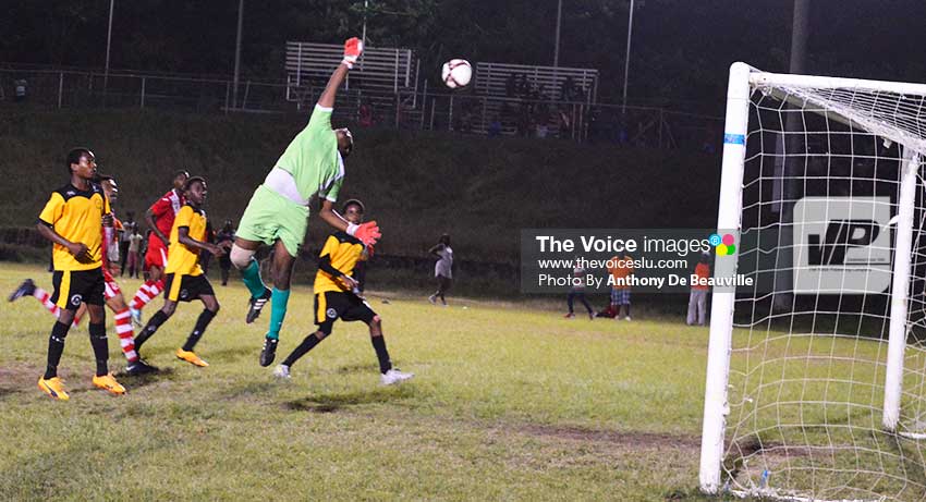 Image: Sports Locker Northern United custodian Stavone Gabriel makes a brilliant save to deny Linus Clovis a scoring opportunity midway into the second half. (Photo: Anthony De Beauville)