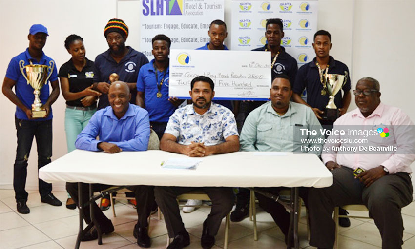 Image: The 2017 SLHTA championship team, Coconut Bay, proudly displaying their winnings with SLHTA officials. (PHOTO: Anthony De Beauville)