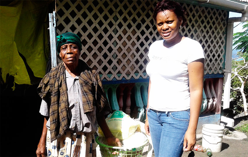 Image: Rotary Club of Gros Islet delivering hampers last Christmas.