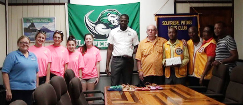 Image: Slippery Rock University officials presenting donation to local representatives.