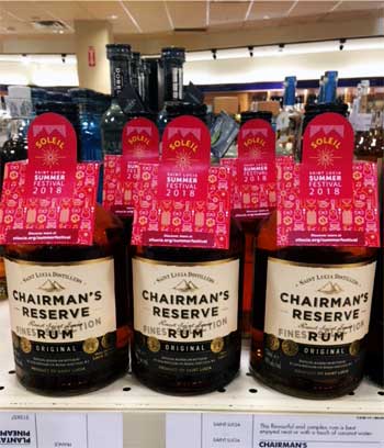 Image: Chairman’s Reserve Rum with the Soleil Summer Festivals souvenir custom bottle neck collars.