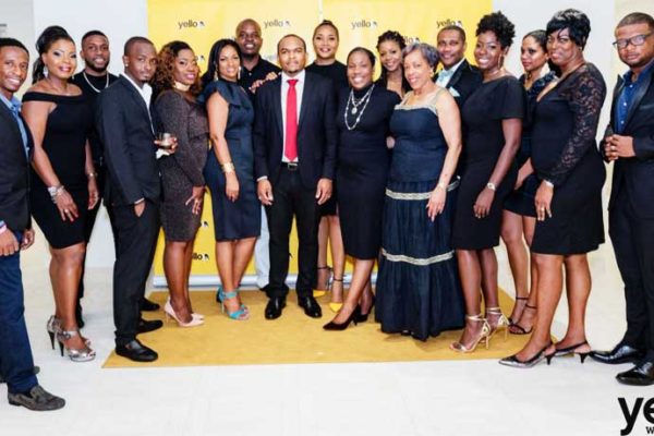Image of CEO of Yello Media Group, Colin Francis (centre) with the Yello family.