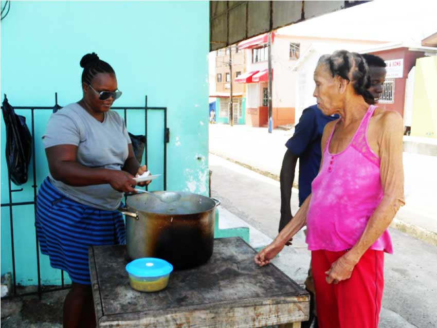 Image of Flerin helping out those in need