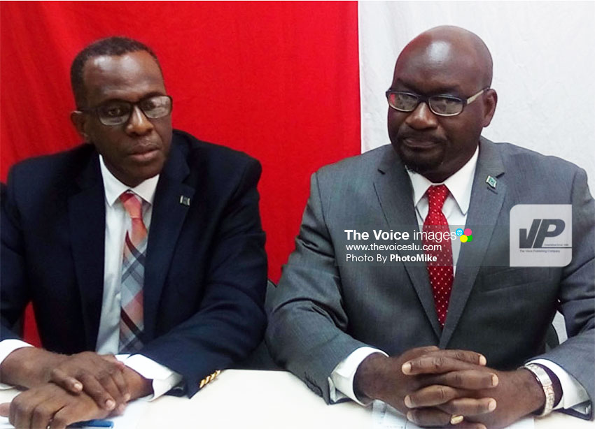 Image of Jn. Baptiste (right) and SLP Political Leader, Philip J. Pierre. (PhotoMike)