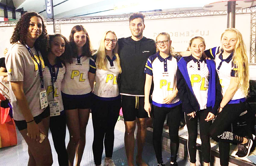 Image of Katie with members of her team, Plymouth College. (PHOTO: KK)