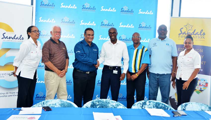 Image of Sandals and SLNCA representatives at this week’s press conference.