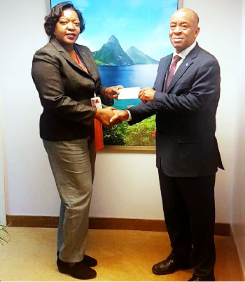 Image of Ambassador Richardson (right) and AmbBannis-Roberts.