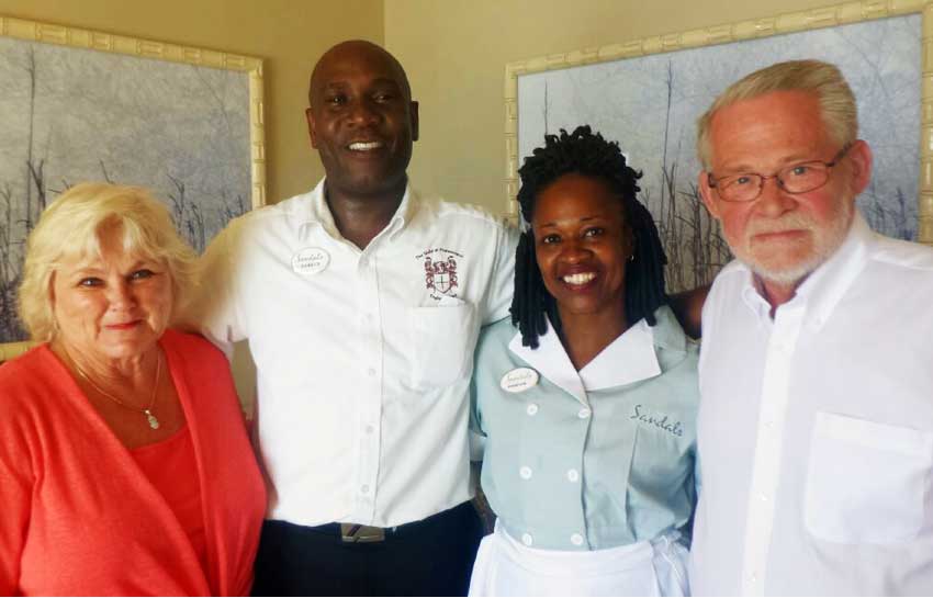 Image: The Hansens with Sandals staff.