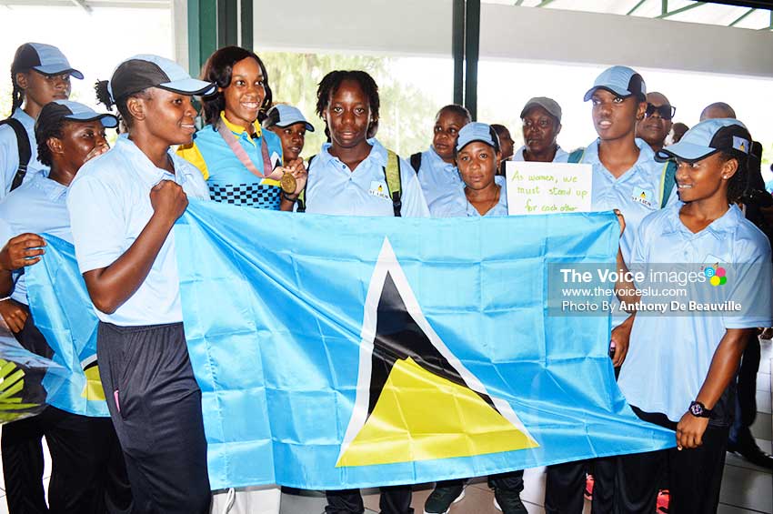Image: A picture moment for the Commonwealth Games High Jump Champion and Saint Lucia National Senior Women’s Cricket Team (Photo: Anthony De Beauville)
