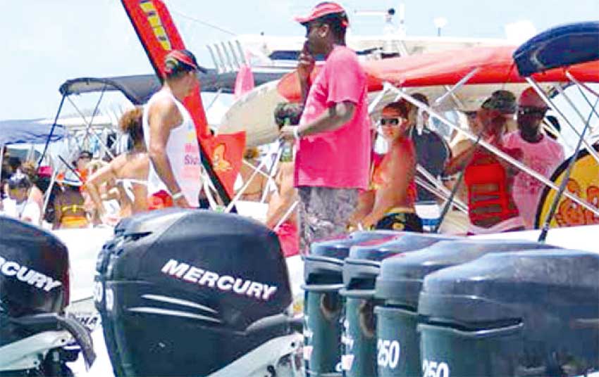 Image of A scene from a past Mercury Beach party to Pigeon Island national landmark.