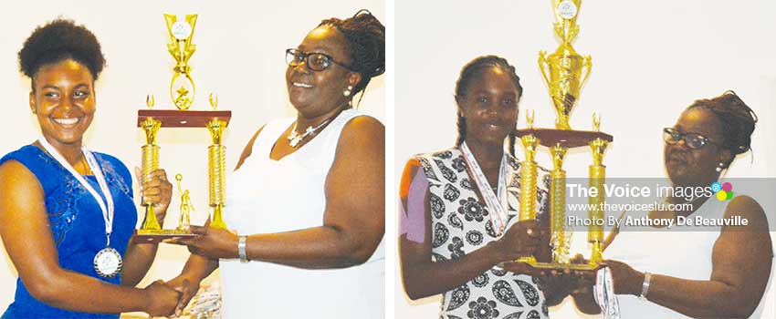 Image: (L-R) Saint Lucia female basketball captain and netball captain receiving the second and first place trophy from Director of Youth, Mary Wilfred. (PHOTO: Anthony De Beauville)