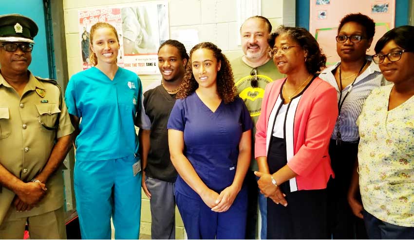 Image of Health Minister Mary Isaac and Sandals Great Shape staff and participants.