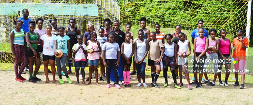 Image: Some of the participants take a time out for a group photo soon after a training session. (Photo: Anthony De Beauville)