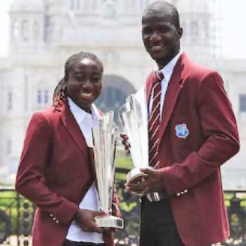 Image of Daren Sammy with Stafanie Taylor after Windies won the men's and women' World T20s in 2016. (Photo: Getty Images)