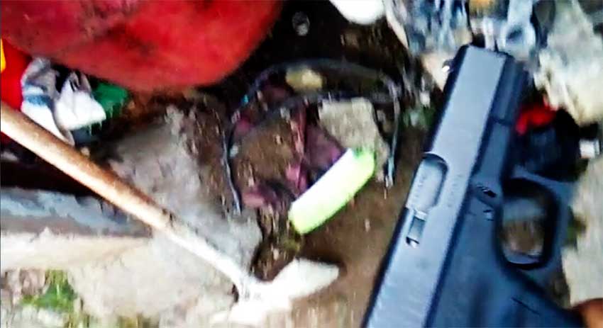 Image of the individual boldly shows off a firearm to accentuate the threats being made.