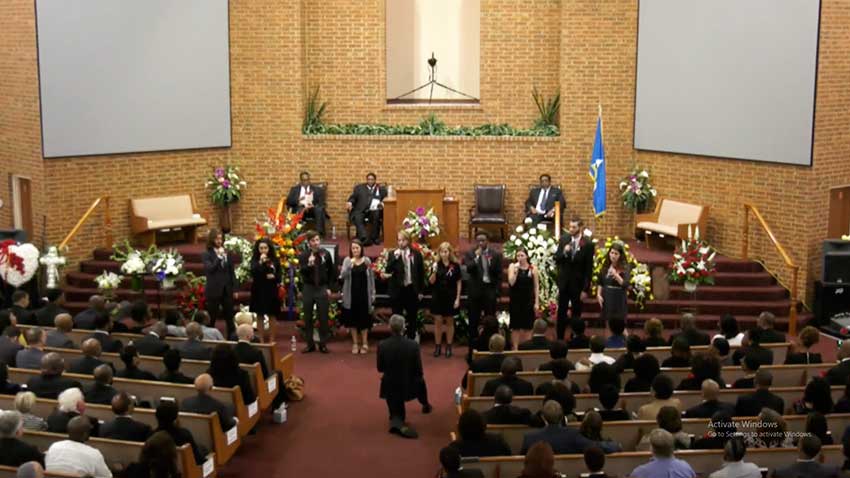 Image of The Good News Singers lustily delivering one of his favourite Psalms