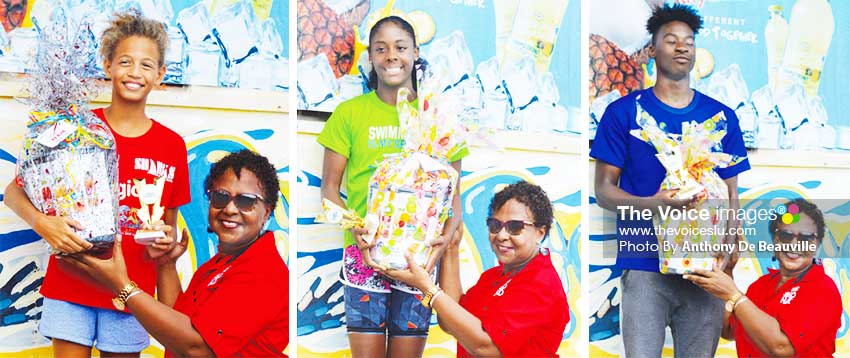 Image: (L-R) High point winners Jasmine Stiede (Sharks) 9-10 girls; Naekeisha Louis (Lightning Aquatic)11-12 and Omar Alexander (Seajays) 18 and Over receiving their awards from Managing Director, Grace Foods Limited - Angeline Gillings . (PHOTO: Anthony De Beauville)