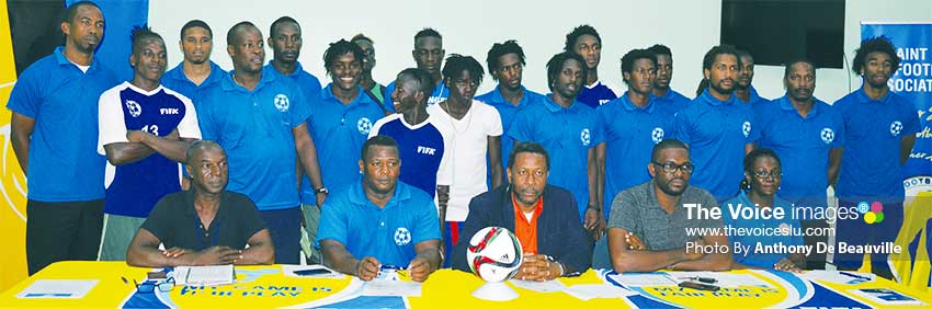 Image: A photo moment for the 17 man squad along with the Technical staff, SLFA President - Lyndon Cooper and SLFA Vice President - Charde Desir. (PHOTO: Anthony De Beauville).