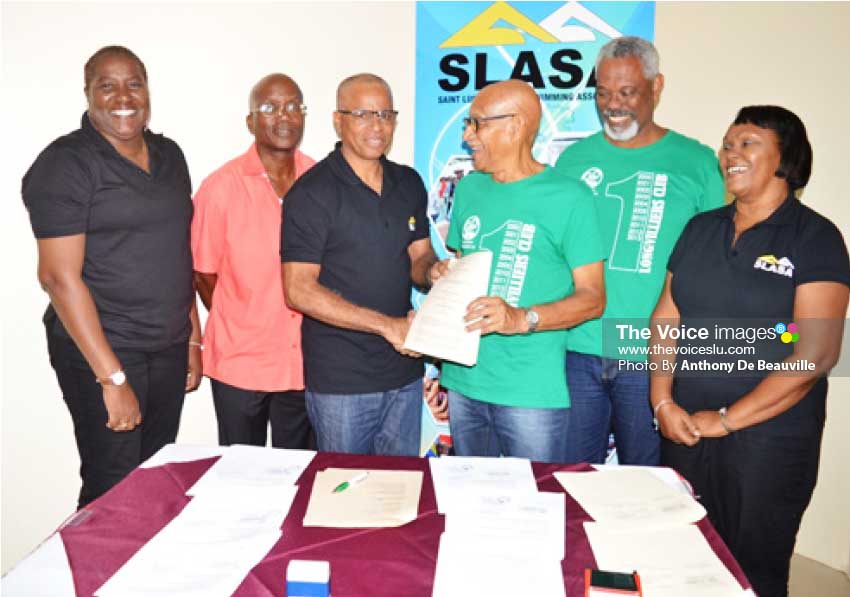 Image: (L-R) Yasmine Tyson (SLASA Development Officer), Donavan Williams (Permanent Secretary- Department of Youth Development and Sports), Eddie Hazell (SLASA President), Robert Marajo (Longvilliers President), Michael Rose (Vice President), Paula James (SLASA Vice President) (PHOTO: Anthony De Beauville)