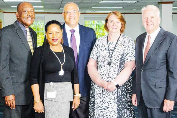 Image: Outgoing Chief Executive Officer; Gary Brown (right) Colette Delaney, CEO Designate and new Chair of the FirstCaribbeanComTrust Foundation (second right); Mark St. Hill, Trustee and Managing Director, Retail and Business Banking, Debra King, Trustee and Director of Corporate Communications; Clenell Goodman, Trustee. Missing are: Lynda Goodridge, Trustee and overseas-based Trustees Trevor L. Torzsas and Ladesa James-Williams.