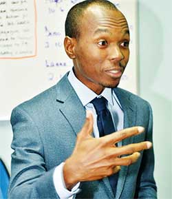 Image of Dominic Fedee, Minister for Tourism and Broadcasting & MP for Anse la Raye and Canaries