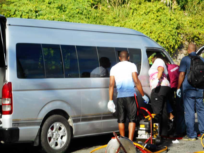 Image: Joseph the driver being extricated from the vehicle by the Jaws of Life. (PHOTO: Kingsley Emmanuel)