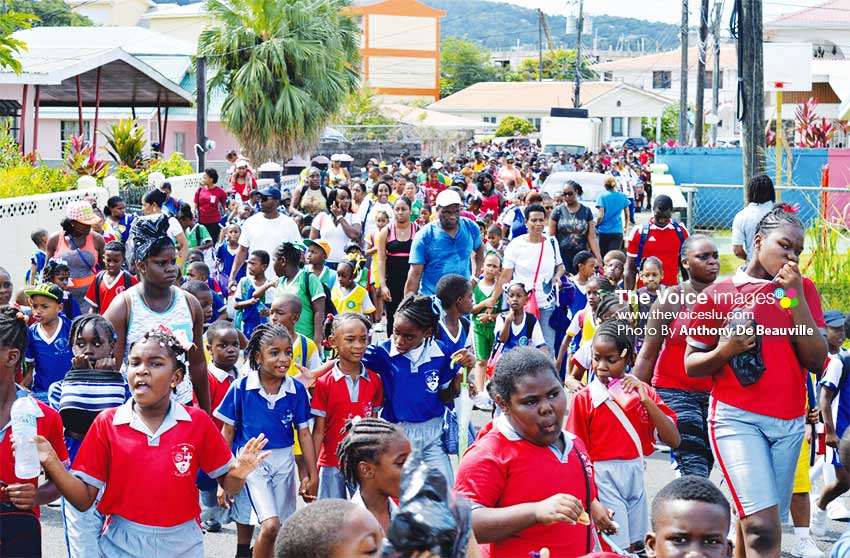 Image: Students walking under the theme ‘Healthy Bodies for Energetic Minds’. (PHOTO: Anthony De Beauville)