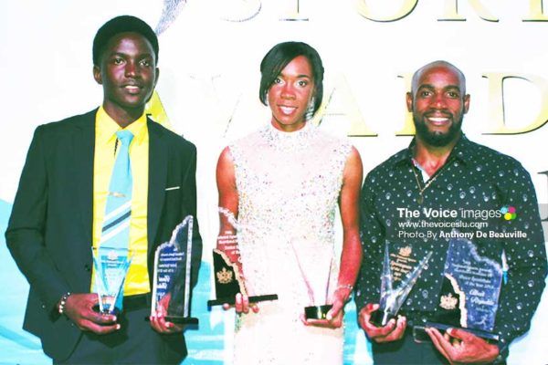 Image: (L-R) A proud moment for the Babonneau connection, Kimani Melius (Junior Sportsman for the Year), Levern Spencer and Albert Reynolds (Senior Sportswoman and Sportsman for the Year). (PHOTO: Anthony De Beauville)