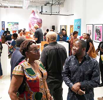 Image: The opening of the AFRO FUTURE art show by CADA & the Miami Design District.