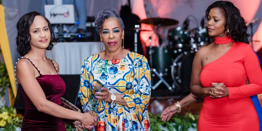 Image of Managing Editor Kayra Williams collecting the award on behalf of The VOICE. (PHOTO: Belle Portwe)