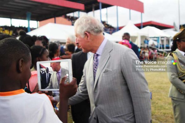 Image: A spectator gets up close and personal to royalty. (PHOTO: PhotoMike]