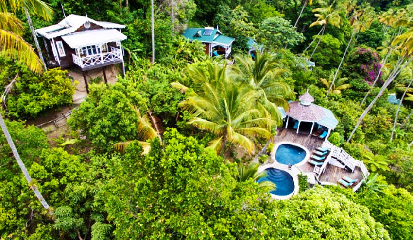 Aerial view of cottage and pools at Fond Doux Plantation & Resort.