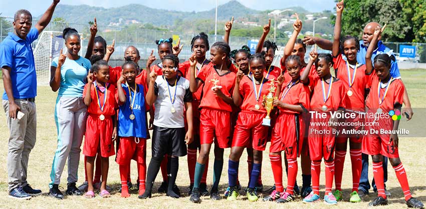 Image: Champion team, District 6 celebrate their victory. (PHOTO: Anthony De Beauville)