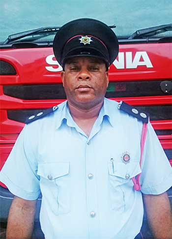 Image of Alyn Roserie, Officer in Charge of the Dennery Fire Station.