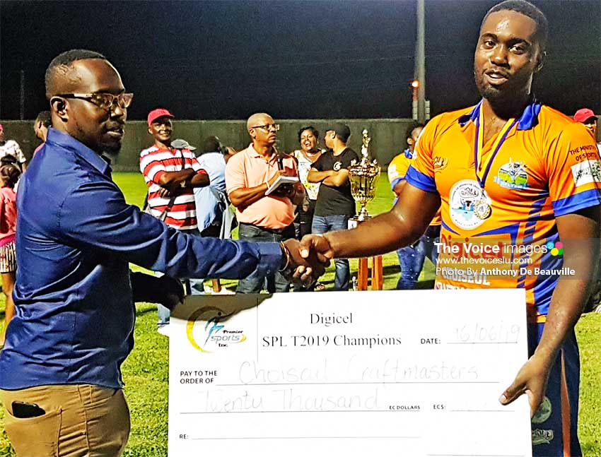 Image: A member of the SPL T20 Team Kirby Sydney presenting CCM captain Bronte Bess with a cheque worth EC$20,000.00. (PHOTO: Anthony De Beauville)