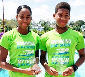 Image: (L-R) Lightning Aquatics Swim Club second place winners, Naima Hazell (13-14 girls) and Karic Charles (11-12 boys). (PHOTO: LA)