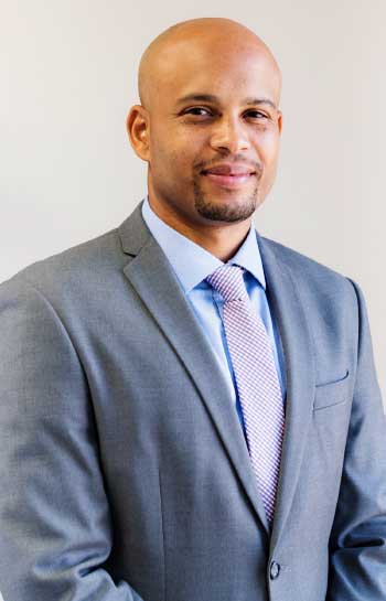 Image of Mozel Isaac - Executive Manager, Information Technology at 1st National Bank.