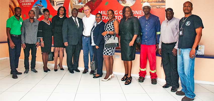 Image: Saint Lucia’s Infrastructure, Ports, Energy and Labour Minister, Stephenson King (fifth from left) with bakers and other officials, during a recent visit to the Caribbean Grains Flour Mill. King reiterated Government’s support for the evolution of the local baking industry, and encouraged young people to be part of the “noble profession of baking”.