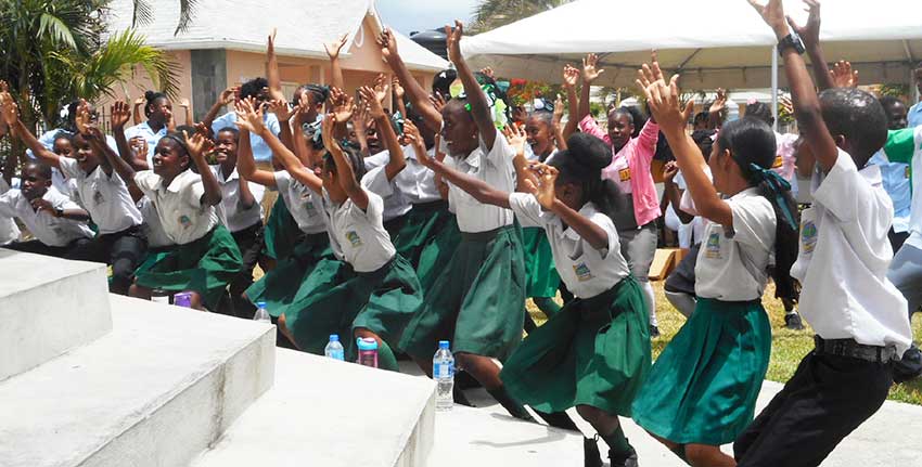 Image: Students getting into the activity with simple exercises to keep healthy.