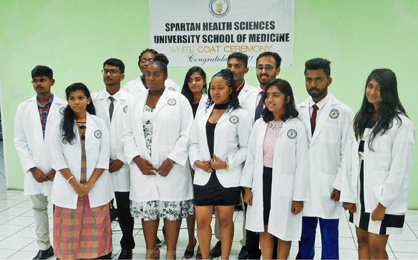 Image: The White Coat Ceremony held in Vieux Fort symbolized the entrance of the students into the medical profession. [PHOTO: Kingsley Emmanuel