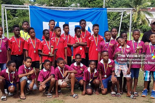 Image: A proud moment for Black Panthers (Soufriere) Under 11s finishing 2nd and Under 13s placing 3rd respectively.(PHOTO: Anthony De Beauville)